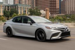 2022 Toyota Camry Hybrid Driving in Silver
